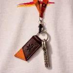 Llavero 100% piel bicolor Burdeos y Naranja (fabricado en Ubrique)